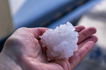 Hail balls in march, natural springtime weather, can cause damages - obrazy, fototapety, plakaty