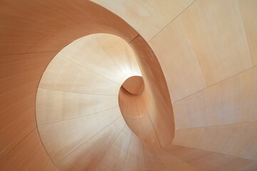 Modern architectural spiral wooden staircase - obrazy, fototapety, plakaty