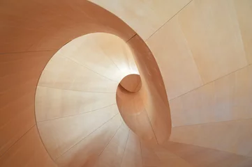 Poster Modern architectural spiral wooden staircase © Justine