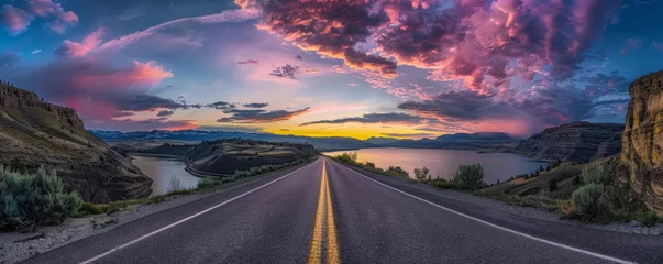  Journey to Dusk: Scenic Road Leading Towards a Sunset by the Mountains © Farnaces