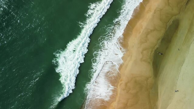 Aerial view of Praia da Nazare, Portugal.Beautiful aerial of Nazaré, Portugal with its rugged coastline, beautiful beaches and surfing waves.