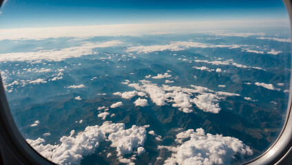 Aerial view captured from an airplane window, showcasing the vast expanse of the sky and earth below.