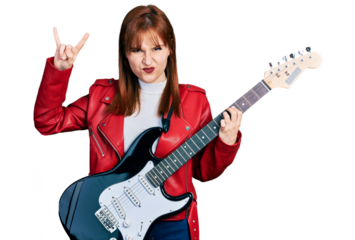 Redhead young woman playing electric guitar doing rock gesture skeptic and nervous, frowning upset because of problem. negative person.