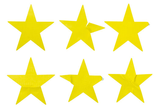 A set of yellow star shape paper sticker label isolated on white background.