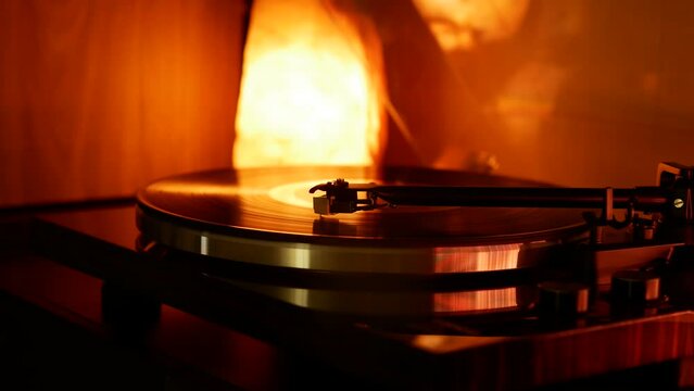 Retro vinyl player with a rotating record.
