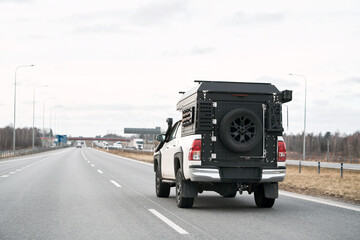 An Adventure Truck with a Camper Box Ready for Any Road Challenge