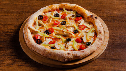 Delicious chicken pizza isolated on wooden background