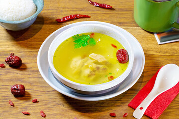 Clear soup with tofu. Chinese food.