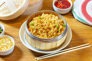 Rice with vegetables: peas, corn and carrots. Chinese food.