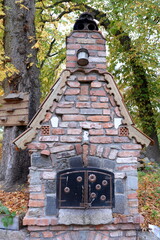 An outdoor oven near a tavern on the territory of the Valdavian Castle Museum. Nizovye village,...