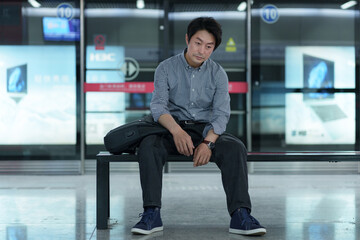 Subway platform fatigue middle-aged men