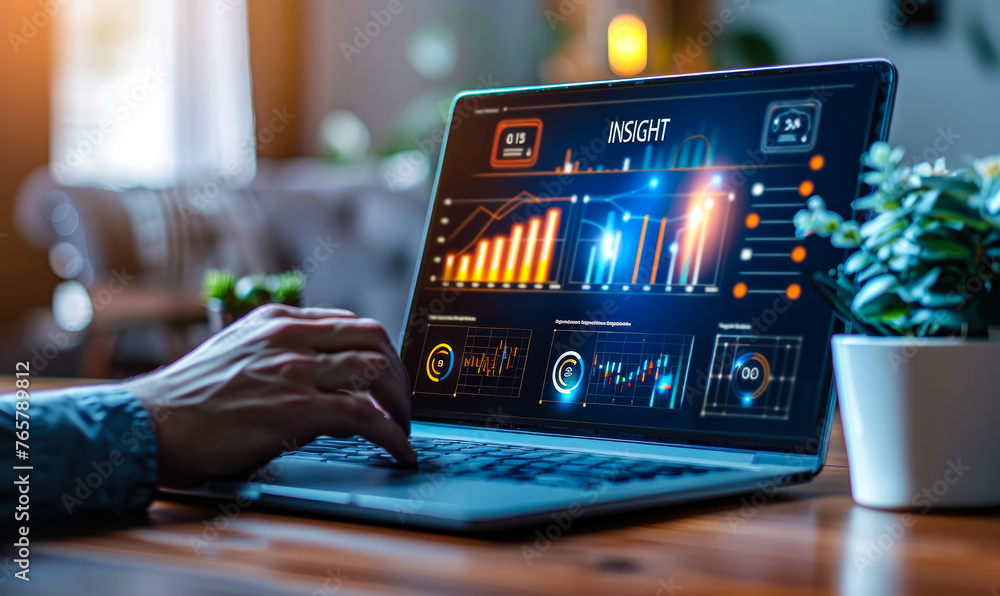 Poster professional gaining critical business insight using interactive data analysis tools on laptop in dy