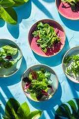 Green salad on blue background. Flat lay. Summer food concept.
