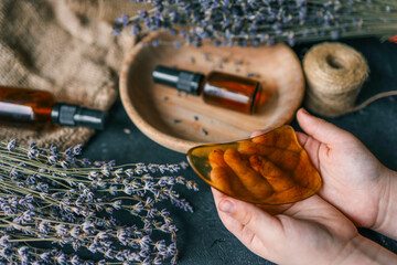 Natural cosmetic product with lavender and gua sha scrapers