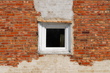 Window and old brick wall.