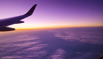 Airplane wing view during sunset