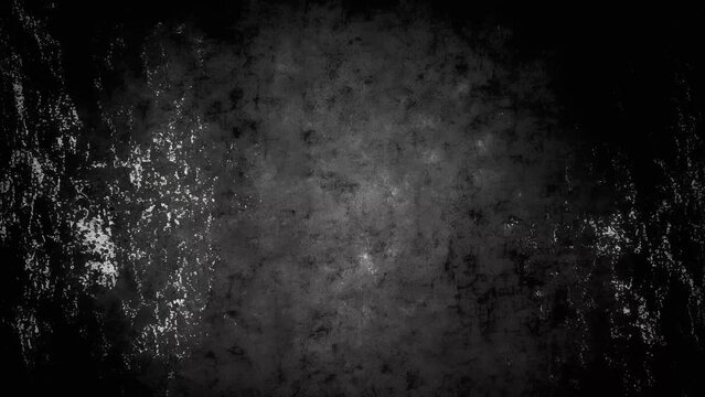 Old, damaged abstract grunge surface on a black background