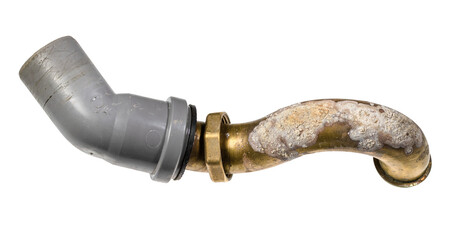 brass bathtub sewer pipe covered with corrosion with plastic elbow isolated on white background