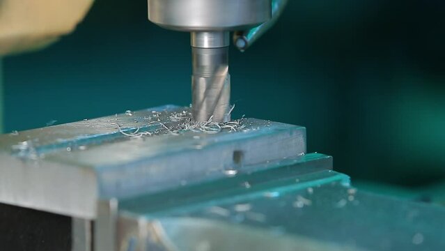 drilling, machining high precision VMC turning machine drilling on metal component in shaping forming process vertical machining centre control automation milling workpiece rotating