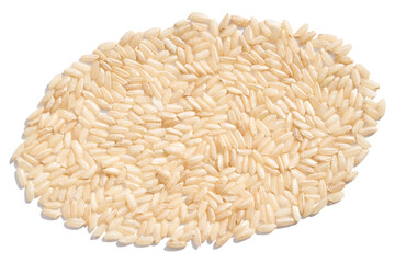 An oval of raw brown and white rice, forming a pile on an isolated background. The texture and...