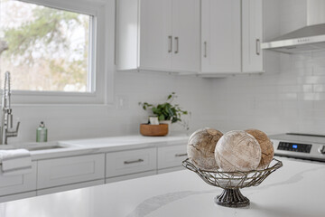 Marble Island Styled with Wooden Ball Accent in Modern White Kitchen Interior, Modern Windows