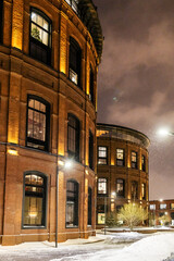 old factory buildings after renovation on snowy night in Moscow city