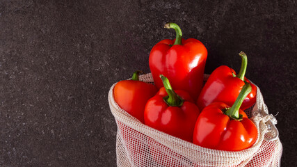 red bell pepper on a dark background. copy space