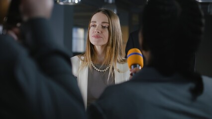 EU politician during press campaign. Positive female Representative of the European Union talks...