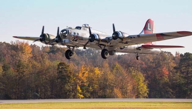 B-17 Bomber Taking Off from a Runway with Landing Gear Extended.