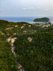 Aerial drone view small Koh Ma island, Ko Phangan Thailand. Exotic coast panoramic landscape, Mae Haad beach, summer day. Sandy path between corals. Vivid seascape, mountain coconut palms from above.