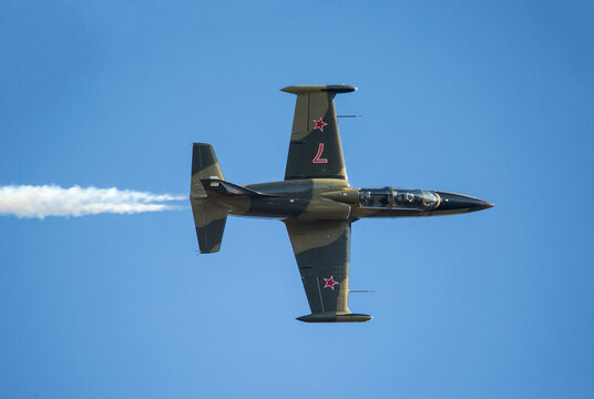 L-39 Albatros Jet Flying Against Deep Blue Sky