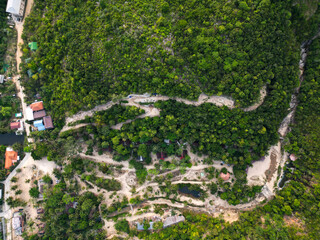 Aerial drone view small Koh Ma island, Ko Phangan Thailand. Exotic coast panoramic landscape, Mae Haad beach, summer day. Sandy path between corals. Vivid seascape, mountain coconut palms from above.