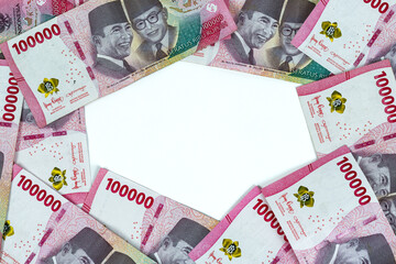 Indonesian rupiah currency. Background of IDR 100,000 rupiah banknotes. financial condition. Top...
