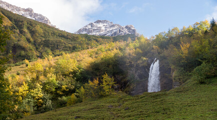 stunning autumnal landscape Oytal valley with Stuibenfall waterfall and mountain view, allgau
