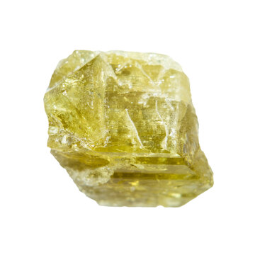 close up of sample of natural stone from geological collection - raw chrysoberyl crystal isolated on white background from Madagascar
