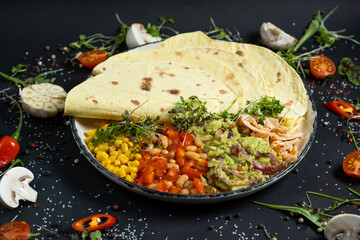 Mexican tacos on pita with vegetables salad, meat, pepper and corn on rustic wooden white table background. Recipe traditional food. Top flat view, overhead.
