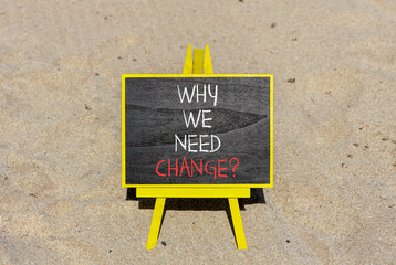 Why we need change symbol. Concept words Why we need change on beautiful black chalk blackboard. Beautiful sand beach background. Business and why we need change concept. Copy space.