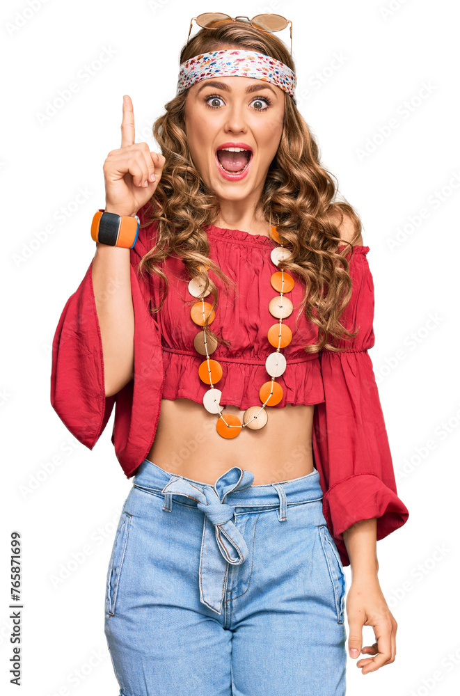 Canvas Prints young blonde girl wearing bohemian and hippie style pointing finger up with successful idea. exited 