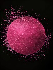 A pink substance is prominently displayed in the center of a stark black background, creating a striking contrast