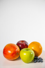 Healthy fresh fruits on white background