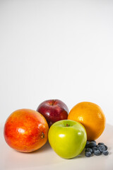 Healthy fresh fruits on white background