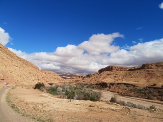 A blue sky with scattered clouds on a beautiful sunny day