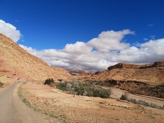 A blue sky with scattered clouds on a beautiful sunny day