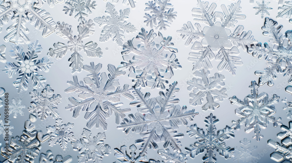 Poster delicate snowflakes with intricate designs are showcased up close, revealing the unique patterns of 