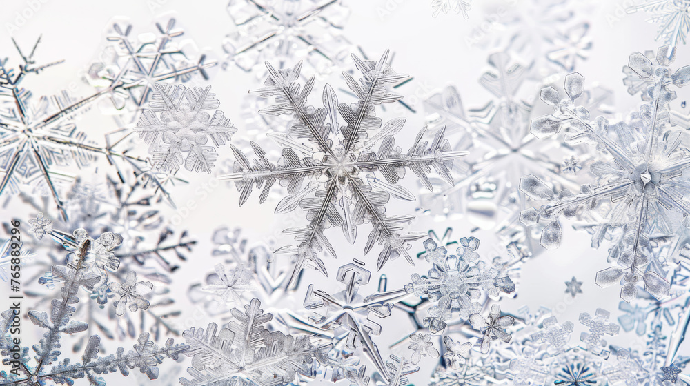 Poster delicate snowflakes with intricate designs are showcased up close, revealing the unique patterns of 
