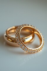 Two delicate gold wedding rings with stones with a white background, generated with AI