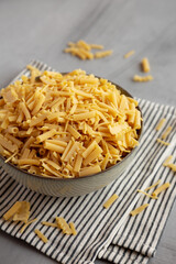 Dry Assorted Italian Pasta in a Bowl, side view.