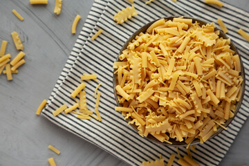Dry Assorted Italian Pasta in a Bowl, top view. Flat lay, overhead, from above.