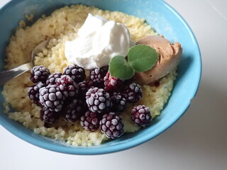 sweet porrifge with fruit and cream