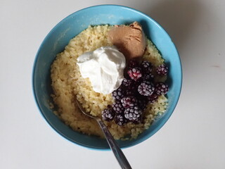 sweet porrifge with fruit and cream